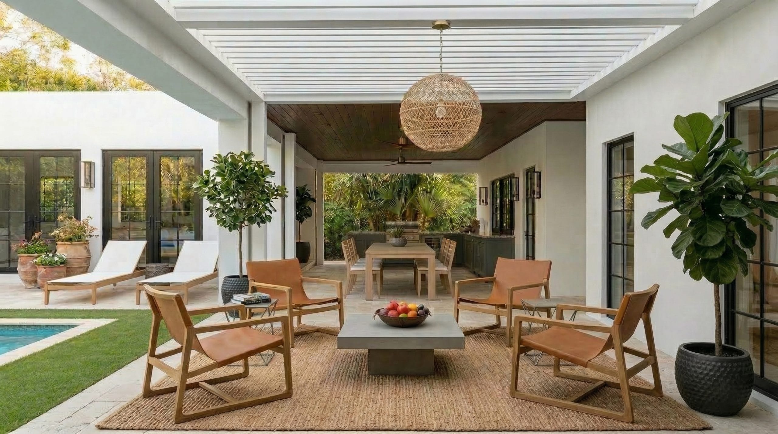Freestanding lounge chairs, coffee table, and dining set on a covered patio