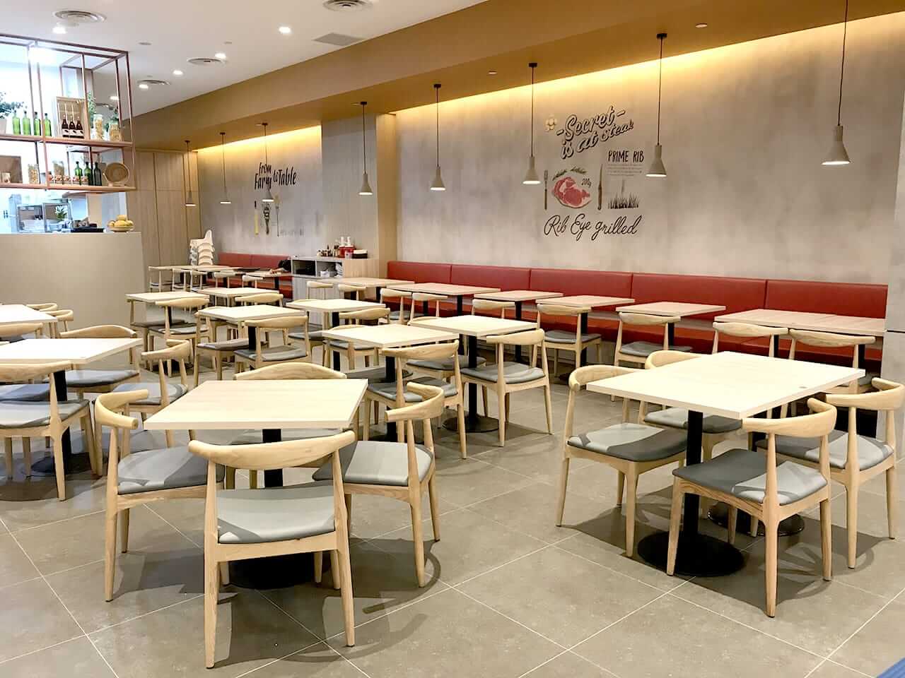 Repeated restaurant seating and table program rolled out across a multi-location chain