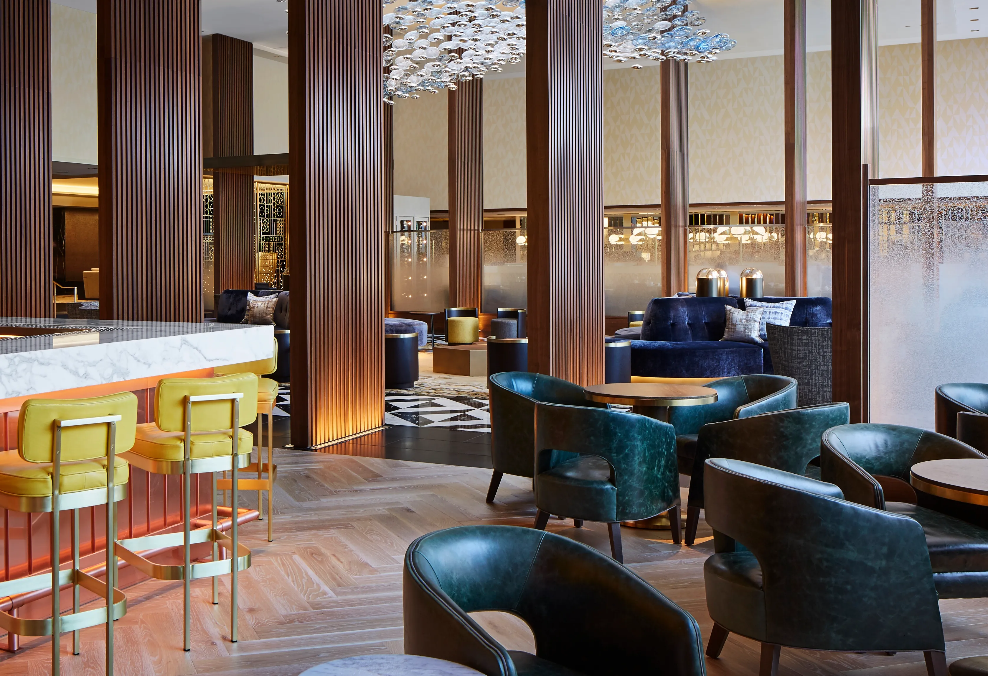 Consistent furniture and finishes across hospitality property spaces