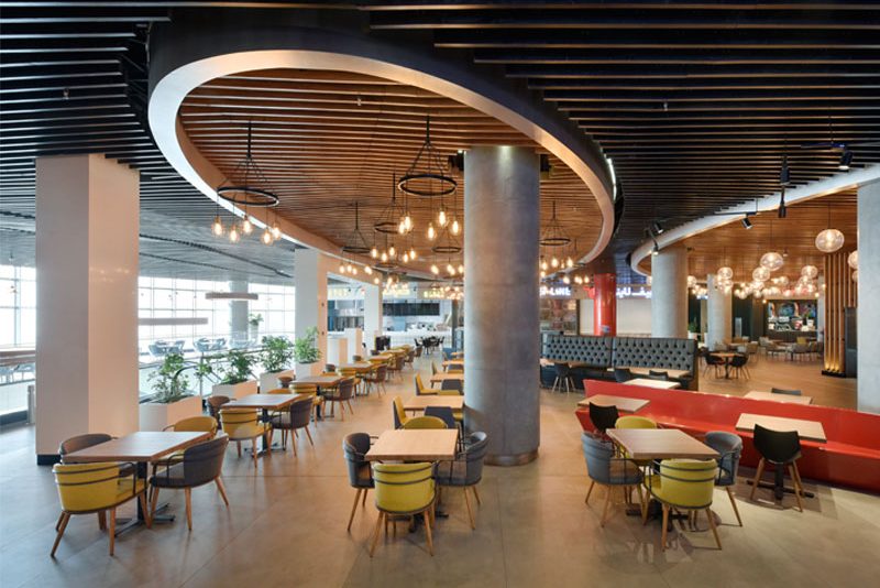 Multi-vendor food hall with coded, repeatable location signage