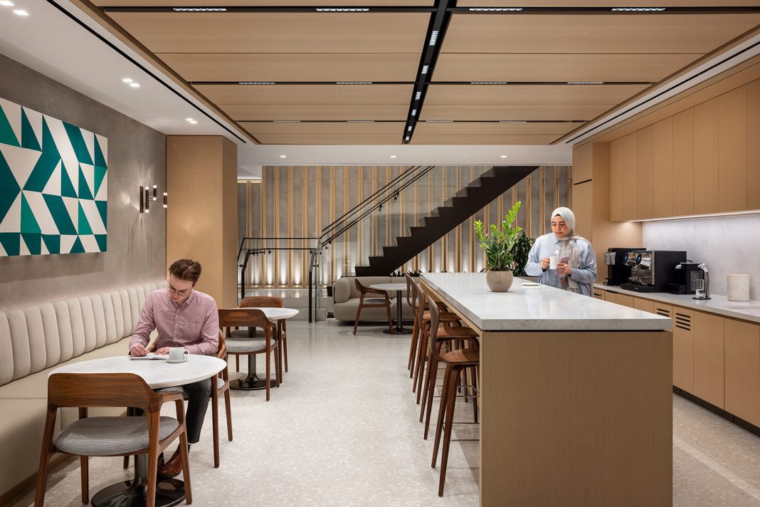 Workplace pantry and amenity area with coordinated finishes and lighting